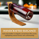 Close-up of the olive wood grain and smooth sanded finish on the wine bottle holder